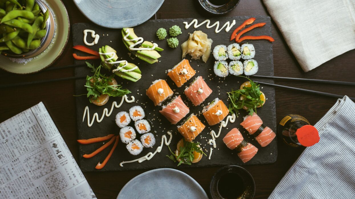 Sushi on a black plate